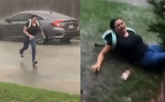 Nữ tài xế ngã dập mông khi chạy dưới trời mưa