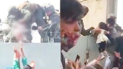 Video: Lính Mỹ nhấc bổng bé sơ sinh qua hàng rào thép gai ở sân bay Kabul để đưa đi cấp cứu