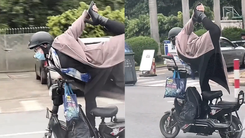 Video: Xôn xao người phụ nữ tạo dáng như tập yoga, đứng trên xe một chân, lái bằng một tay