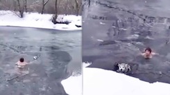 Video: Người phụ nữ 65 tuổi lao xuống sông băng giải cứu con chó bị mắc kẹt