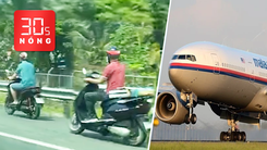 Bản tin 30s Nóng: Xe máy nối đuôi chạy trên cao tốc; Máy bay MH370 giờ ở đâu?