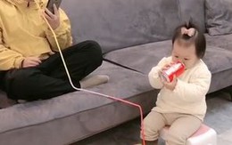 Anh trai mải mê điện thoại bị em gái "chơi khăm"