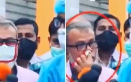 Người đàn ông Ấn Độ dùng khẩu trang ngoáy mũi trên sóng truyền hình