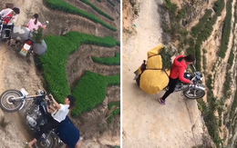 Cô gái chạy xe chở hàng bên sườn dốc núi cheo leo