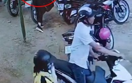 Đôi nam nữ trộm mũ bảo hiểm xịn ở bãi giữ xe