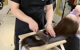 Chàng trai trổ tài cắt tóc bằng dao phay