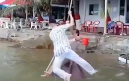 Cặp đôi rơi xuống hồ khi đu dây để chụp ảnh cưới