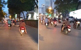 Cô gái chạy xe máy kiểu 'túy quyền' trên phố Hà Nội