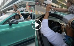 Vlogger Nga trói bạn gái trên nóc Bentley đi dạo trên phố