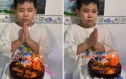 Bé trai nhầm lẫn vái lạy bánh sinh nhật sau khi cầu nguyện
