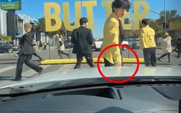 Người qua đường may mắn được một thành viên BTS chạm tay vào ôtô