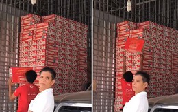 Chàng trai thể hiện kĩ năng xếp thùng bia chồng lên cao siêu đẳng