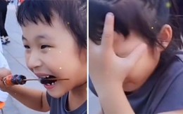 Biểu cảm hài hước của bé gái khi ăn đồ chua