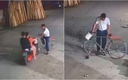 Người đàn ông đi xe đạp sang đường bị cô gái tông vênh bánh
