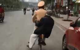 Clip CSGT Hà Nội đạp xe đưa cụ ông đi lạc về nhà 'hot' ngày 2-3