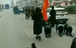 Công ty Trung Quốc phạt nhân viên 'bò trên đường' gây tranh cãi