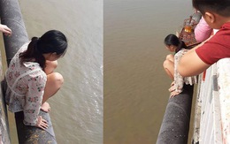 Người mẹ trẻ bỏ lại con trên cầu Chương Dương, định lao xuống sông Hồng
