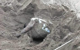 Phát hiện tài xế xe ben bị vùi trong đống cát