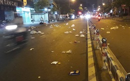 'Lốc rác' bay tứ tung trên đường phố Sài Gòn