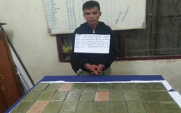 Bắt 2 nghi phạm mang 32 bánh heroin từ Lào vào Việt Nam