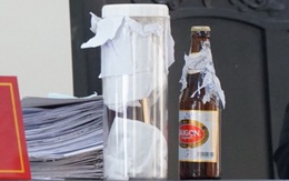 Vụ kiện chai bia còn 1/2 nước: Nên làm gì khi gặp sản phẩm lỗi?