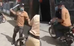 Xôn xao đoạn clip một thanh niên cầm dao uy hiếp cảnh sát giao thông