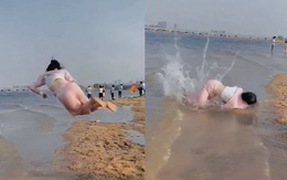 Cô gái quê một cục khi trổ tài lộn santo ngoài bãi biển