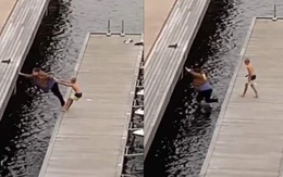 Bé trai kéo tuột tay làm người phụ nữ ngã xuống sông
