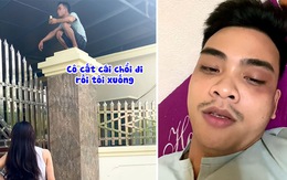 Chồng lầy lội leo lên cột cổng ngồi khi cãi nhau với vợ