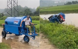 Pha lái máy tuốt lúa đi vào lòng ruộng