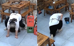 Nữ nhân viên ngã sấp ngửa vì nền nhà trơn
