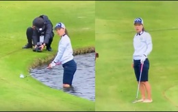 Nữ golf thủ thẫn thờ khi đánh bóng bay xuống hồ