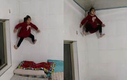 Bé gái leo tường lên trần nhà như Người Nhện