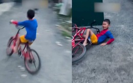 Bé trai tông vào cửa cổng vì xe đạp mất phanh