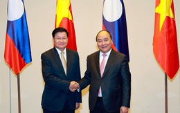 Việt Nam - Lào ký kết 4 văn kiện hợp tác