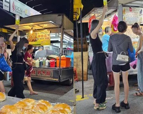 Cô gái dạo chợ đêm cùng chai truyền dịch