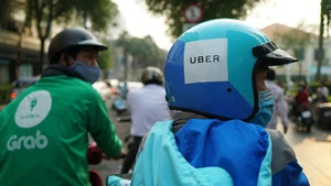 Uber bán thị trường Đông Nam Á cho Grab, Việt Nam thu thuế ra sao?