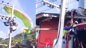 Video: Quá nguy hiểm lúc chơi dù lượn, du khách bị dính vào đường dây điện