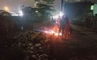 Đi bắt ếch, 2 người đàn ông thấy xác chết nổi trong rác