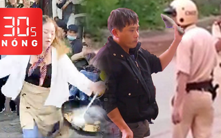 Bản tin 30s Nóng: Tạm giữ người dùng dép đánh vào mặt CSGT; Nữ đầu bếp làm xiếc với chảo
