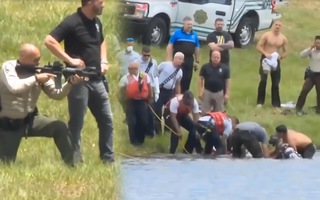 Video: Điều động lính bắn tỉa cá sấu để yểm trợ thợ lặn cứu 2 mẹ con bị tai nạn