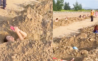 Video: Du khách đào hàng chục hố cát ở bãi biển Cửa Lò để thiền, hình ảnh làm 'dậy sóng' trên mạng