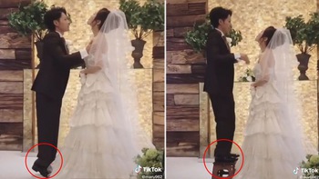 Cô dâu troll chú rể khi hôn nhau trong ngày cưới