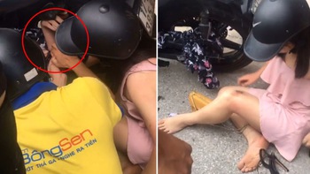 Cô gái té xe nặng vì váy chống nắng bị cuốn vào bánh xe máy