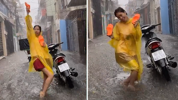 Cô gái xinh đẹp nhảy múa 'theo trend' giữa trời mưa lớn khiến người xem khó hiểu