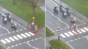 Đoàn biker dừng xe giúp người phụ nữ sang đường