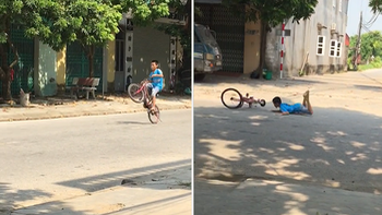 Cậu bé ngã sấp mặt vì trổ tài đi xe đạp một bánh