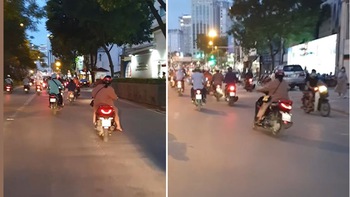 Cô gái chạy xe máy kiểu 'túy quyền' trên phố Hà Nội