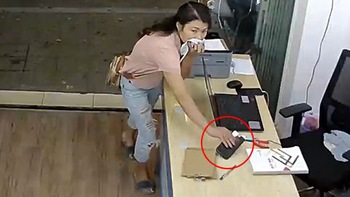 Cô gái dùng mũ che mũi để lộ mặt đi trộm iPhone