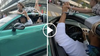 Vlogger Nga trói bạn gái trên nóc Bentley đi dạo trên phố